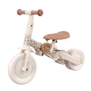 Triciclo con barra blanco flores